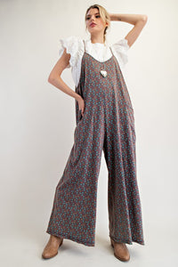-Floral printed cotton jersey jumpsuit
-Sleeveless w/adjustable spaghetti straps &amp; side pockets
-Wide leg raw cut hem and lightweight fabric
-Relaxed loose fit may size down one
-100% cotton knit material