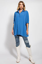 -Pintuck detailing on back for movement &amp; flow
-Boxy &amp; oversized. May size down one or two sizes.
-Button down front closure with Batwing/Dolman sleeves
-Tunic style Top
-96% polyester 4% spandex