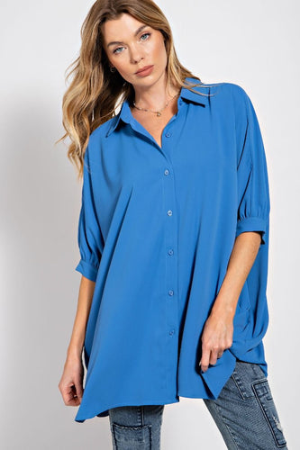 -Pintuck detailing on back for movement & flow
-Boxy & oversized. May size down one or two sizes.
-Button down front closure with Batwing/Dolman sleeves
-Tunic style Top
-96% polyester 4% spandex