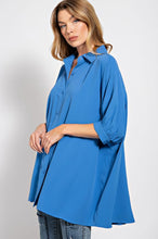 -Pintuck detailing on back for movement &amp; flow
-Boxy &amp; oversized. May size down one or two sizes.
-Button down front closure with Batwing/Dolman sleeves
-Tunic style Top
-96% polyester 4% spandex