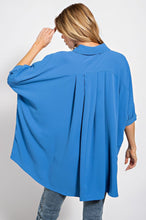-Pintuck detailing on back for movement &amp; flow
-Boxy &amp; oversized. May size down one or two sizes.
-Button down front closure with Batwing/Dolman sleeves
-Tunic style Top
-96% polyester 4% spandex