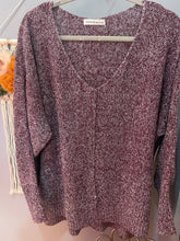purple v neck sweater long sleeves hanging