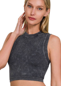 Woman wearing a black ribbed crop top on a white background Cropped tank bra Super stretchy, soft, non adjustable straps, removable padding